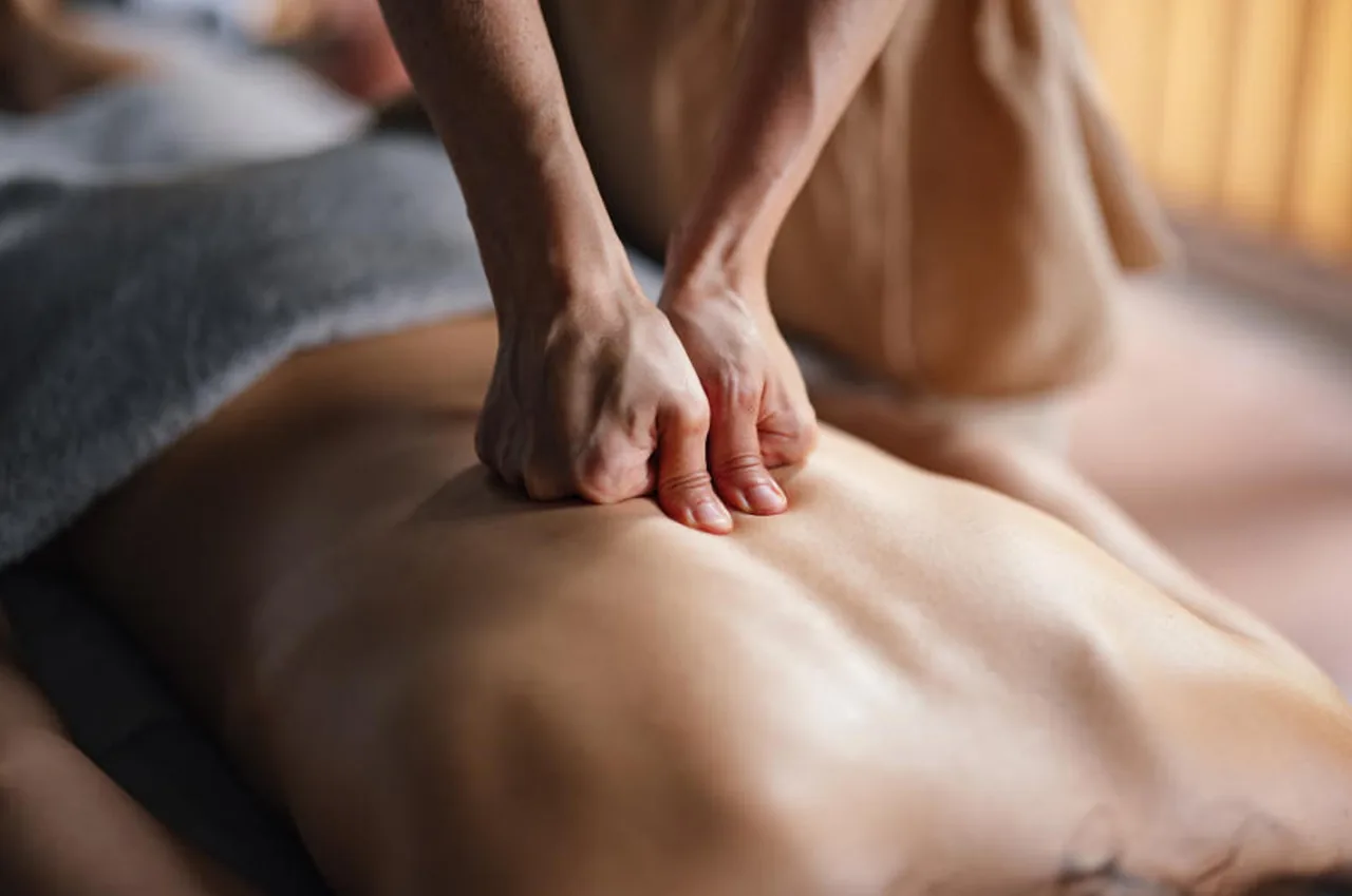 Relaxation massage with even pressure along the back at G Spa Massage Cypress